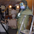 alien-pilot-leaning-against-stepladder.jpg